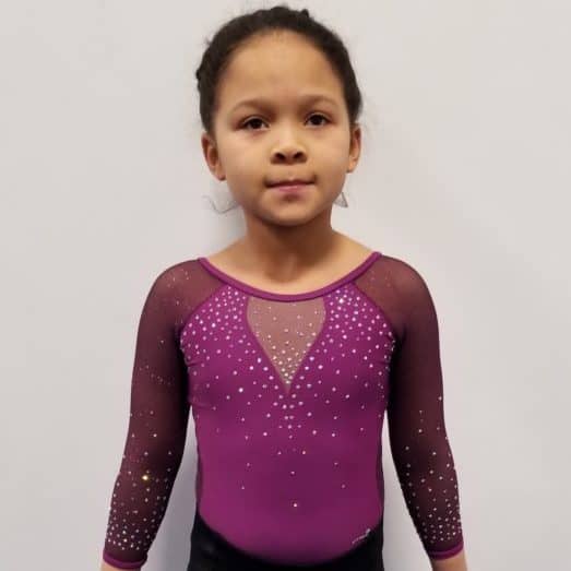 young gymnast with purple leo